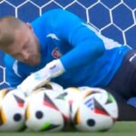 England PLAYERS have fun during ‘MONKEY in the middle’ DRILL to prepare for Denmark in UEFA Euro