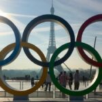 IOC President Thomas Bach CARRIES the Olympic TORCH around The Village and SPEAKS on Paris 2024